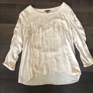 Beige 3/4 length top with ruffle detail